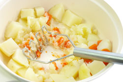 Mashing Cooked Carrots and Potatoes