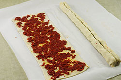 Rolling up Tomato Palmiers