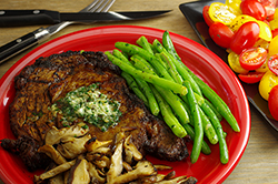 Chili-Rubbed Rib-Eye Steaks with Cilantro Butter