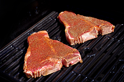 Steaks Raw on Grill