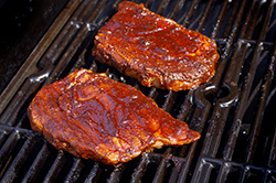 Steaks Raw on Grill