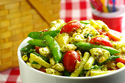 Green Bean, Snap Pea, and Pesto Salad with Cherry Tomatoes and Fresh Mozzarella
