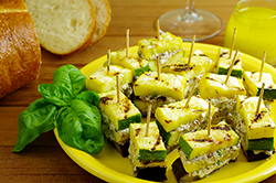 GRILLED ZUCCHINI AND YELLOW SQUASH SACKS WITH FETA AND BLACK OLIVES