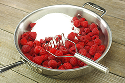 Rasberries and Sugar in Skillet