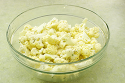 Tossing Cauliflower in Bowl