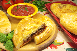 Spicy Sausage Calzone with Marinara Dipping Sauce
