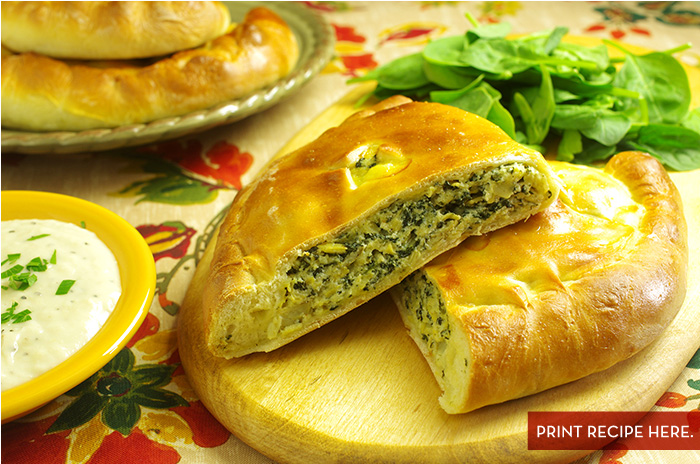 Spinach, Artichoke and Cheese Calzone with Roasted Garlic Dipping Sauce