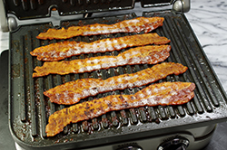 Cooked Bacon on the Griddle
