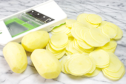 Slicing Potatoes with Handheld Slicer