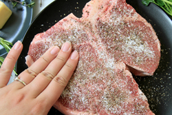 Rub steak with salt and pepper