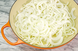 Sliced Onions in Braiser