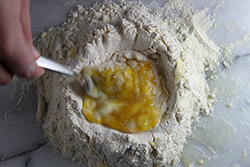 Adding Eggs to Flour