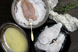 Coat chicken with egg and flour