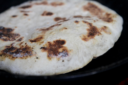 Cook pita in hot pan