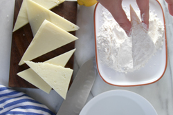 Dip cheese in water and flour