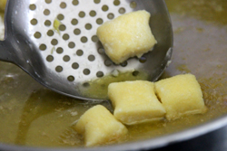 Add cooked gnudi to sauce