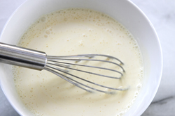 Whisk together liquid ingredients