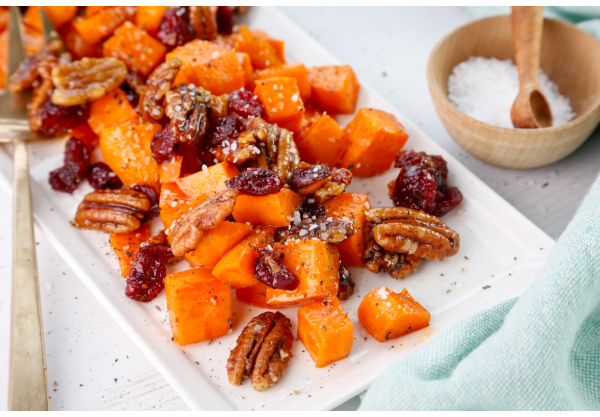 Maple Cayenne Sweet Potatoes with Cranberries and Candied Pecans
